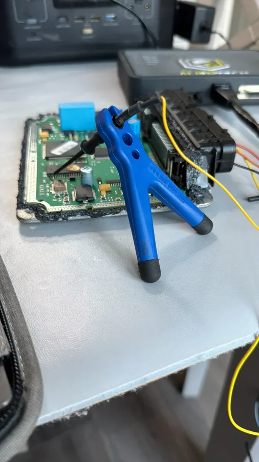 Vehicle electronics and tools on a workbench